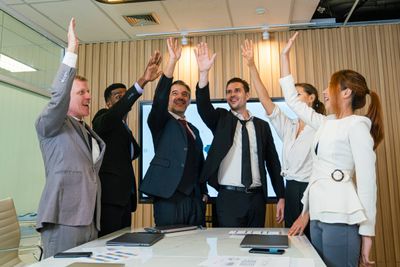 group-of-colleagues-celebrating-success-2024-10-21-23-26-59-utc.jpg