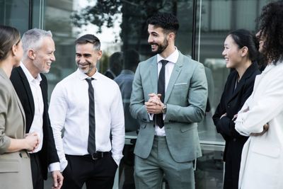 group-of-business-people-group-having-a-casual-mee-2023-11-27-05-23-32-utc.jpg