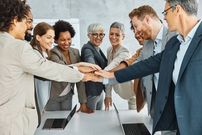 young-business-people-meeting-office-portrait-dive-2023-11-27-05-00-53-utc.jpg