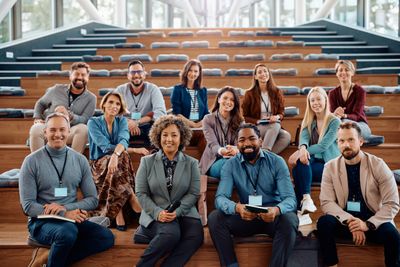 multiracial-group-of-happy-business-seminar-attend-2023-11-27-05-04-14-utc.jpg